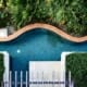 A wavy luxury landscaping feature pool with greenery done by the right partner in northern virginia.